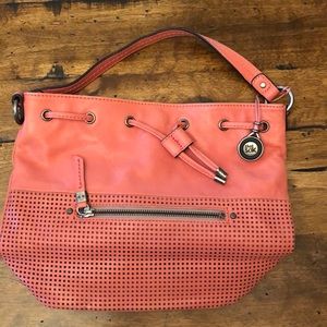 The Sak  coral purse. Never used